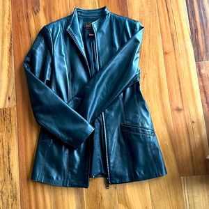 Danier vintage, leather jacket. Women’s size extra small. UK, size 6 to 10.